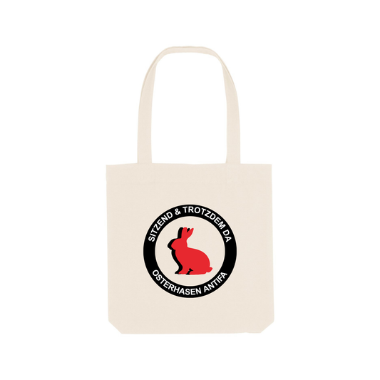 Bio-Tote Bag „Sitzend & trotzdem da – Osterhasen Antifa“